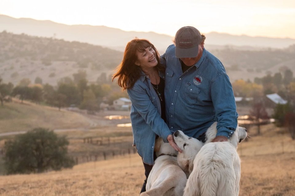Felicia and Mark Morrison with their ranch dogs at Camatta Ranch