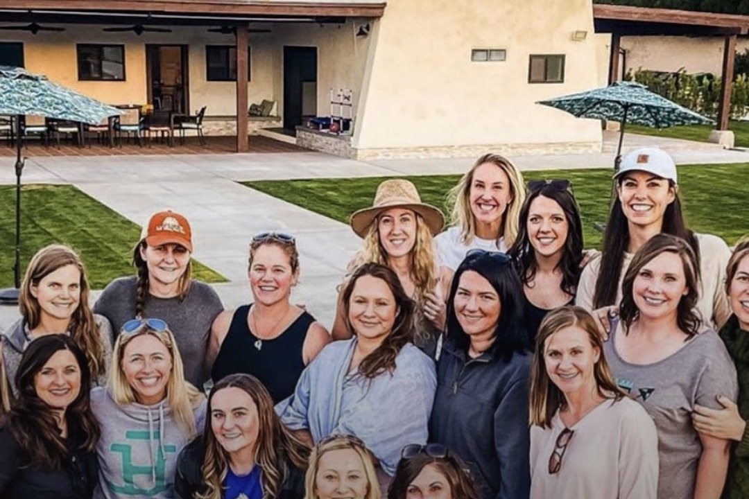 A group of M5 Entrepreneurs gathered outside at an in-person workshop
