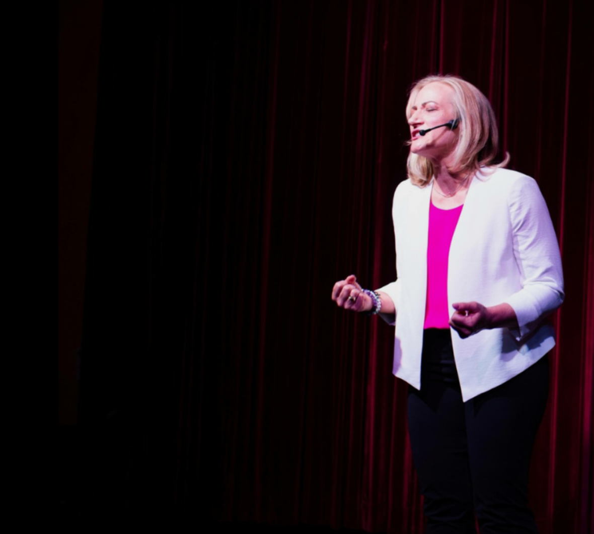 Marsha Vanwynsberghe speaking on stage