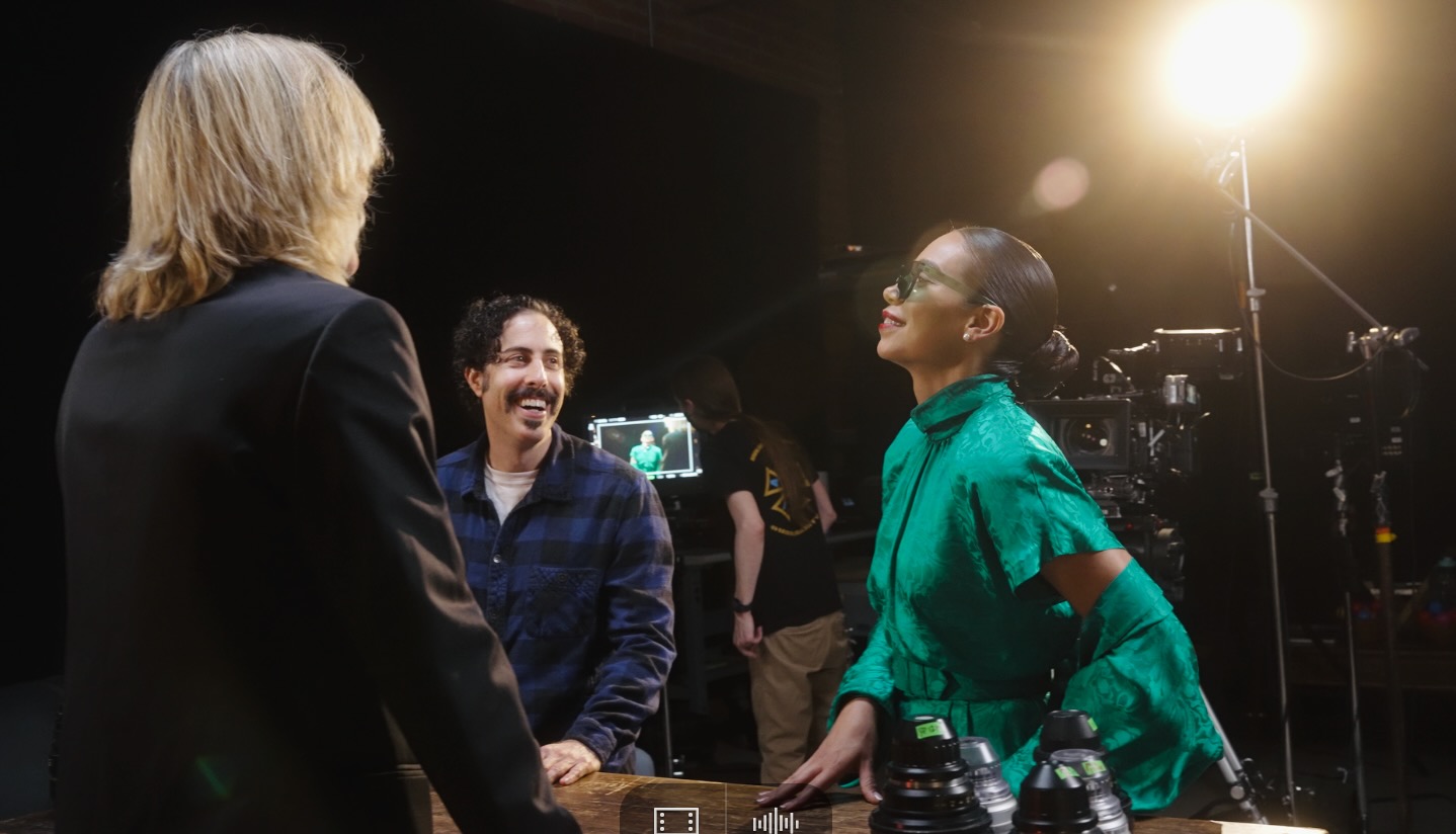 Actors and camera crew collaborating on a Creative HQ set