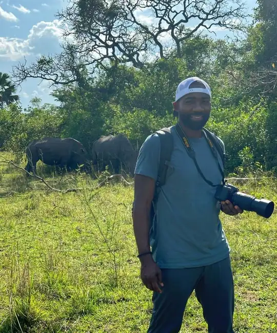 Linal photographing rhino in Uganda