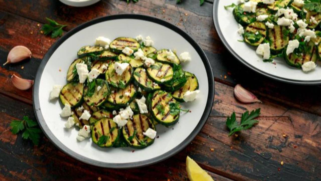 a plate of grilled zucchini salad