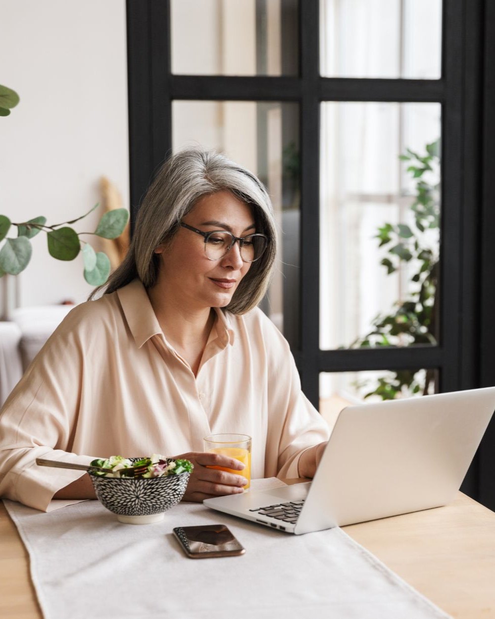 Legal transcription student working from home on a laptop