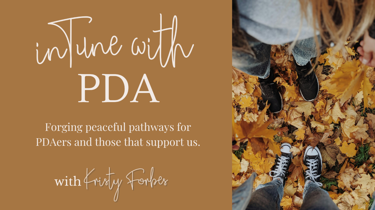 Course cover for “inTune with PDA” in a warm earthy brown and white colour palette. The left side has a solid caramel-brown background with white text reading “inTune with PDA” and the subtitle “Forging peaceful pathways for PDAers and those that support us.” Near the bottom, it says “with Kristy Forbes.”  The right side shows a cropped overhead photograph of people standing outdoors among autumn leaves. Visible are legs and shoes, including black shoes and black-and-white sneakers, surrounded by golden yellow, tan, orange and brown fallen leaves with small patches of green grass.
