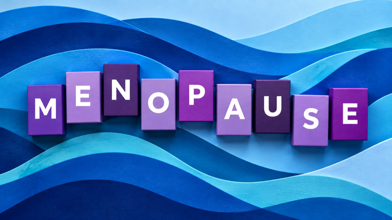 The word menopause in purple blocks over a blue wave