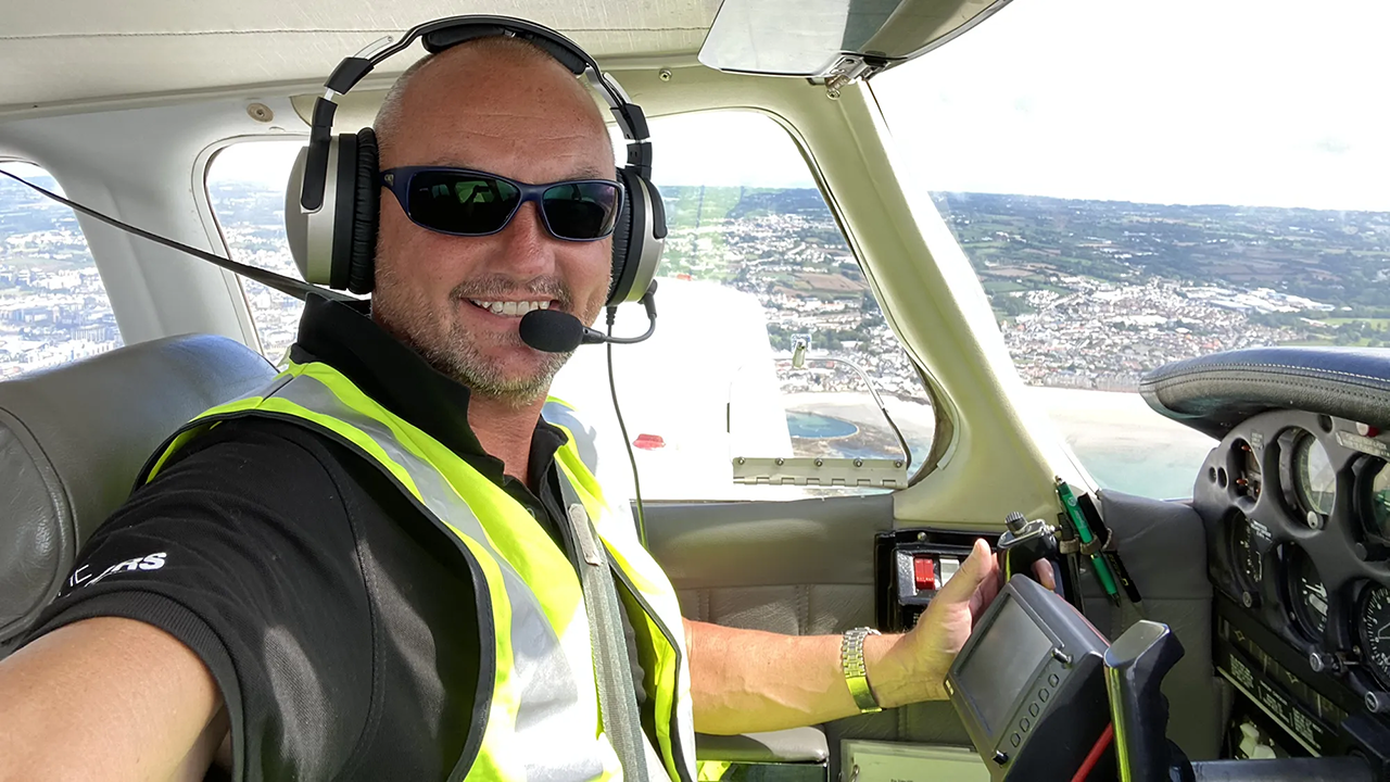 Andy Brown in the cockpit of a light aircraft