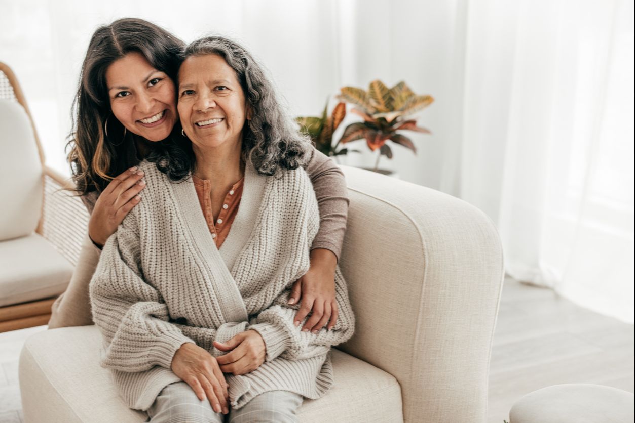 Two women sharing a warm conversation over coffee