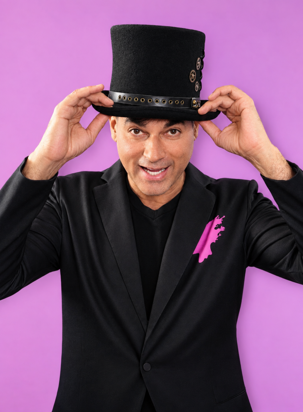 Dr. Reef Karim in colorful top hat