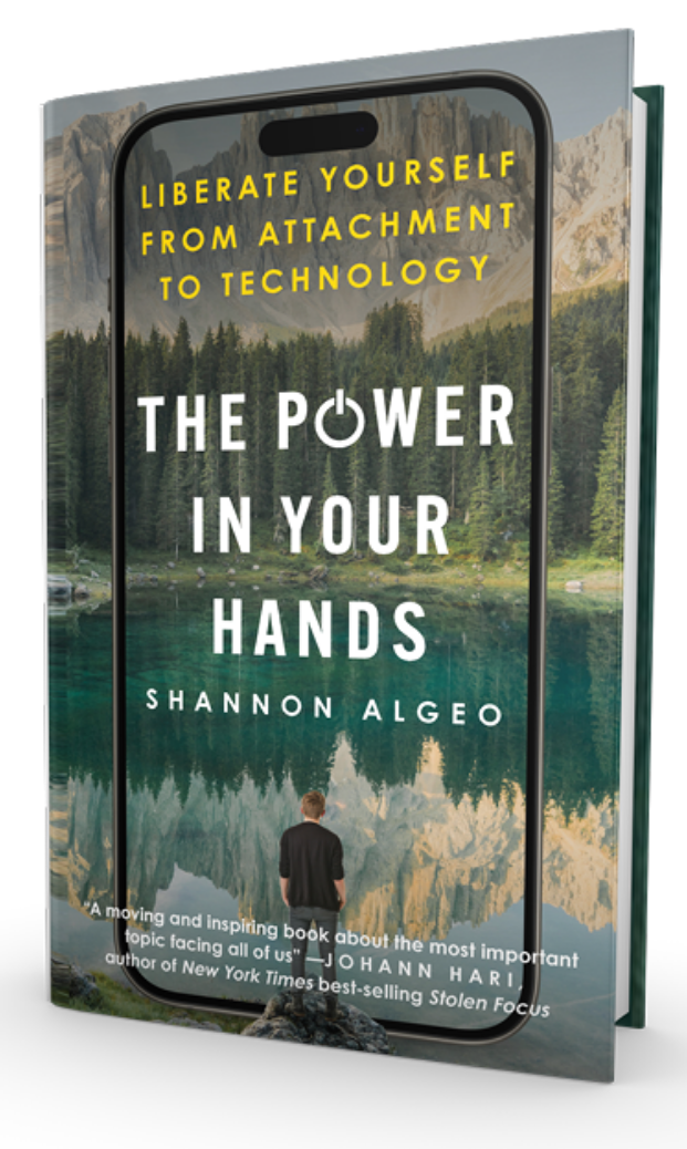 alt="The Power in Your Hands: Liberate Yourself from Attachment to Technology by Shannon Algeo - book cover with mountain lake reflection on smartphone screen"