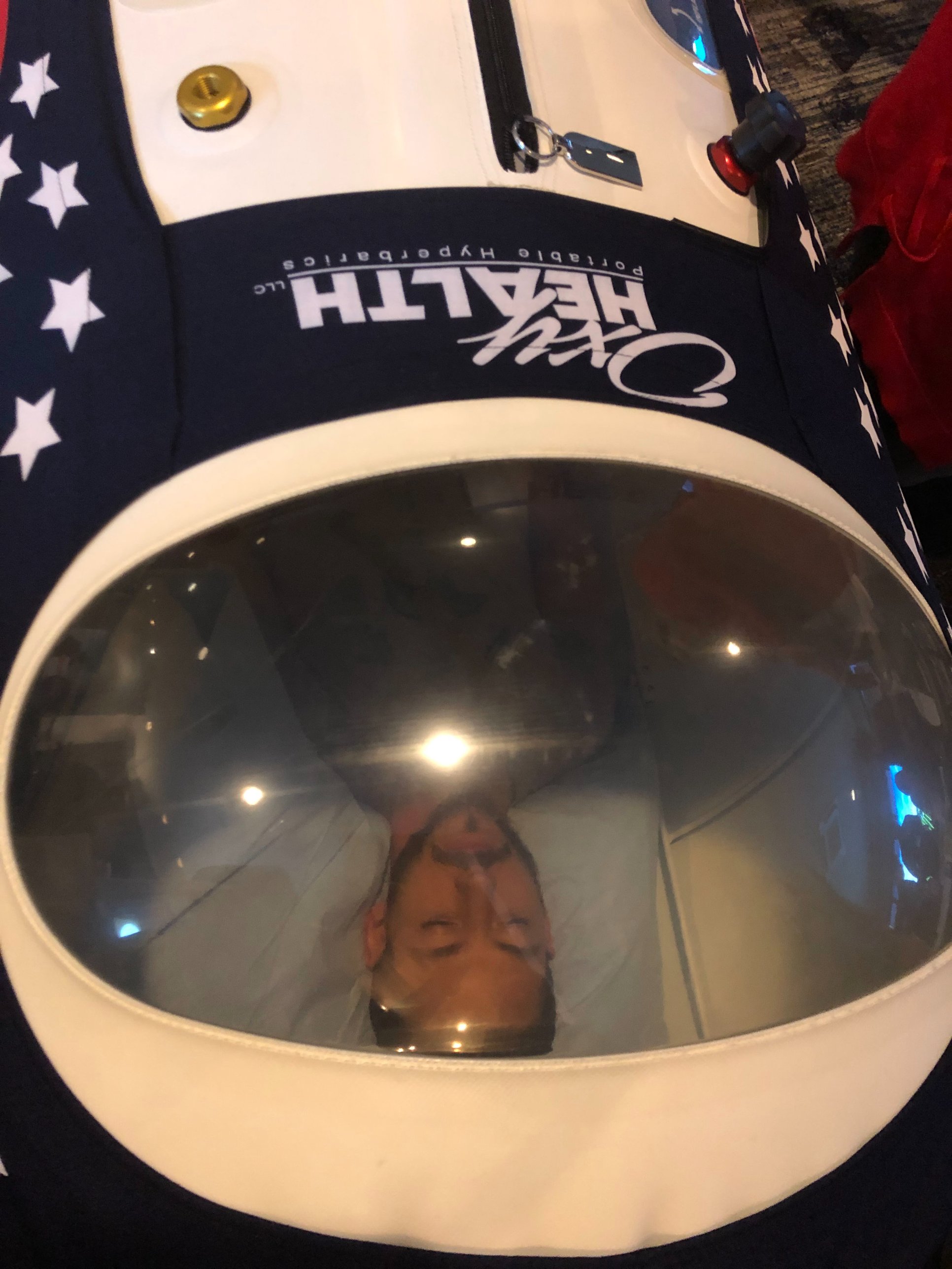 Dr. Nathan Warren relaxing in the HBOT chamber
