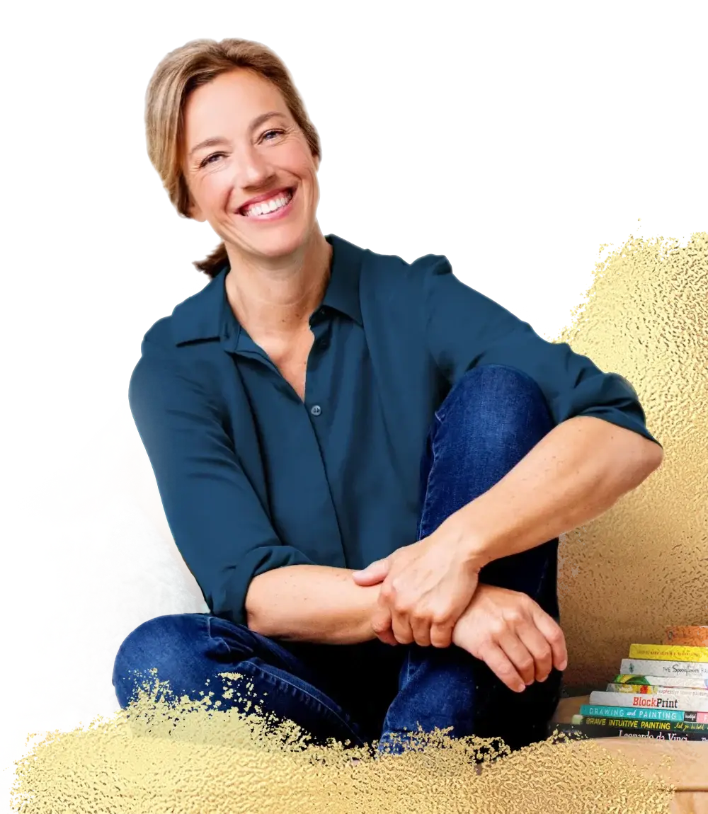 encaustic art online teacher smiling on a sofa