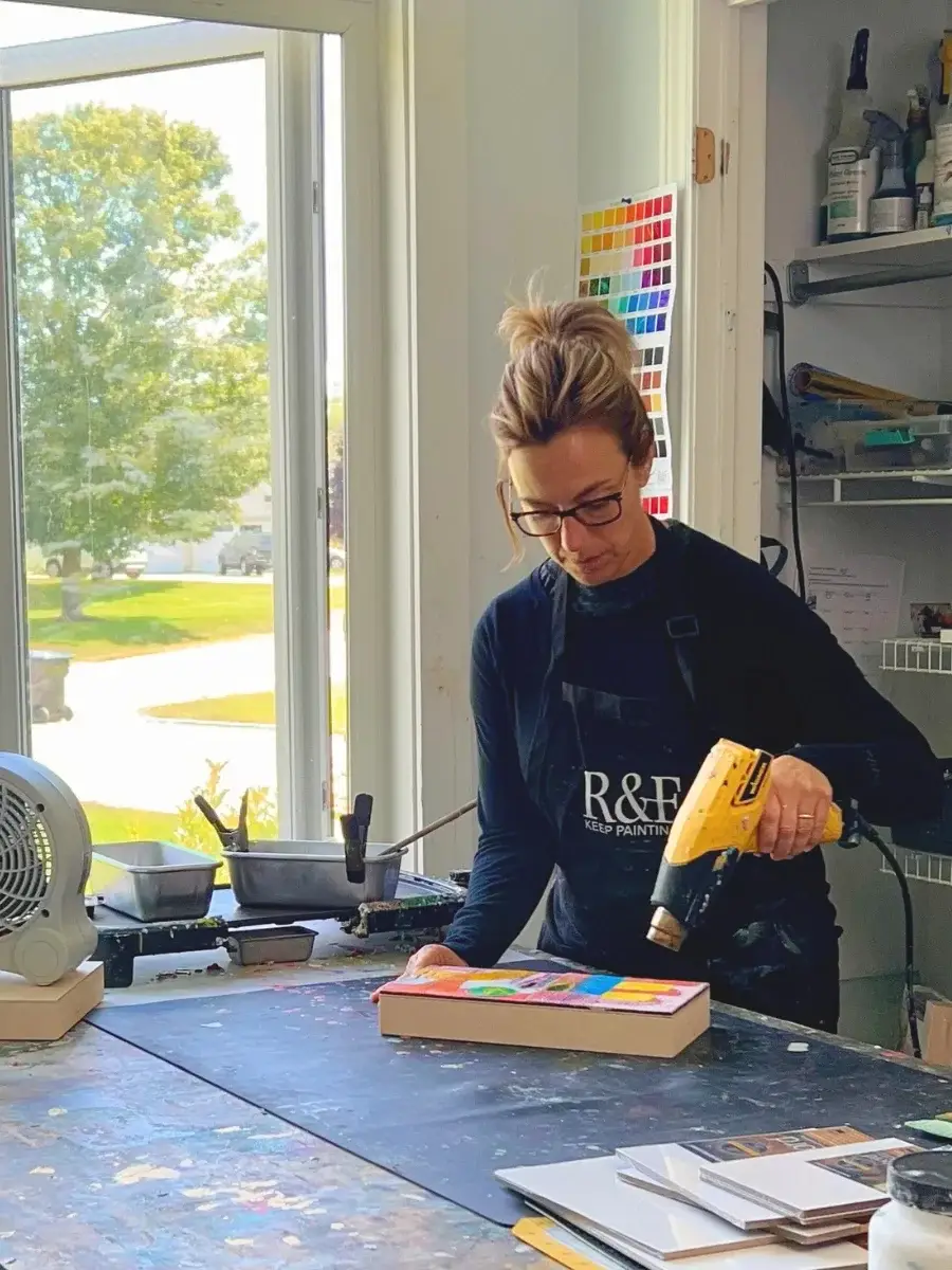 wax encaustic art teacher working in her studio