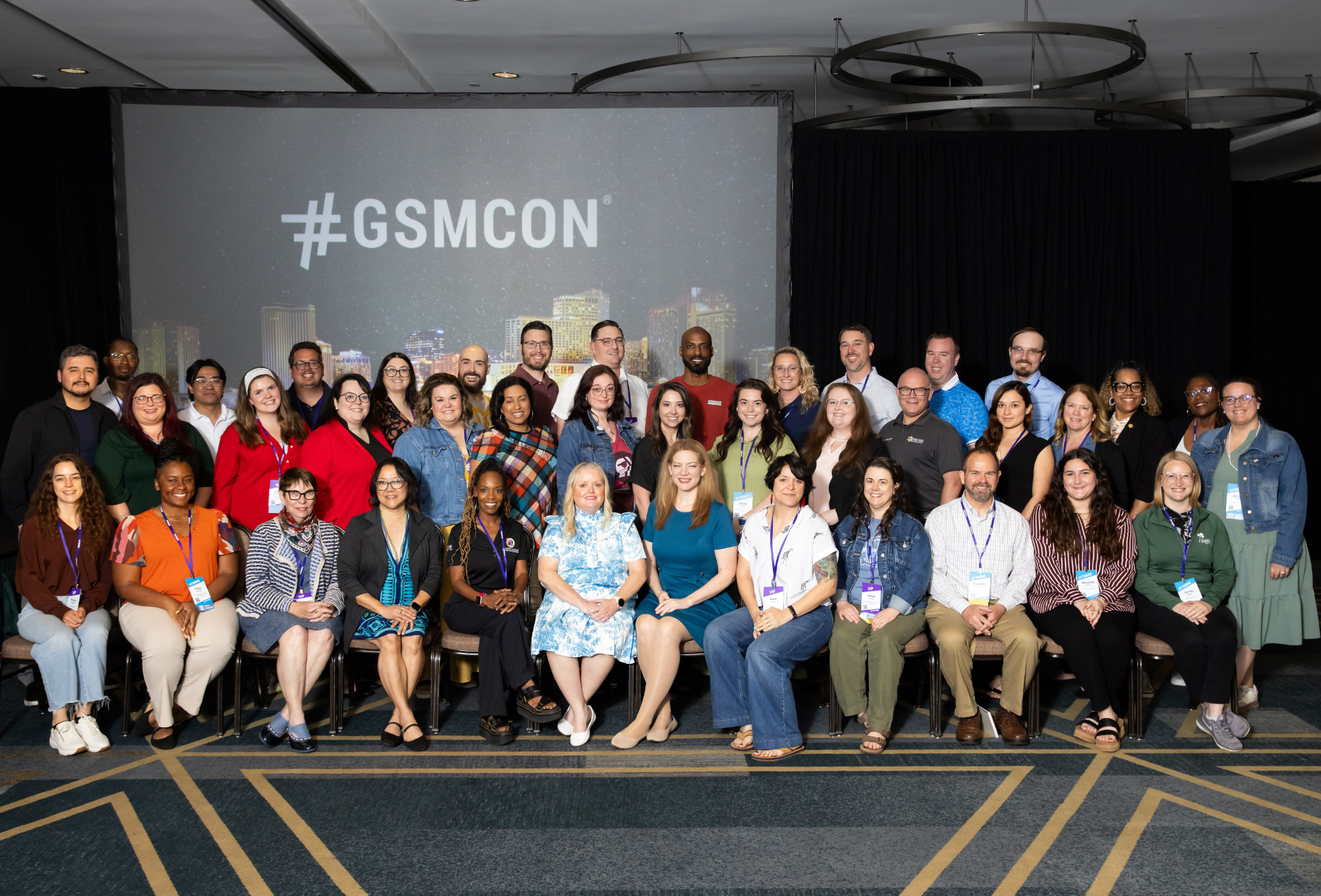 GSMA members posing at the member meeting at GSMCON
