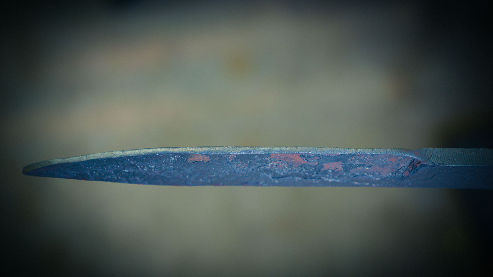 Forged knife blade being inspected