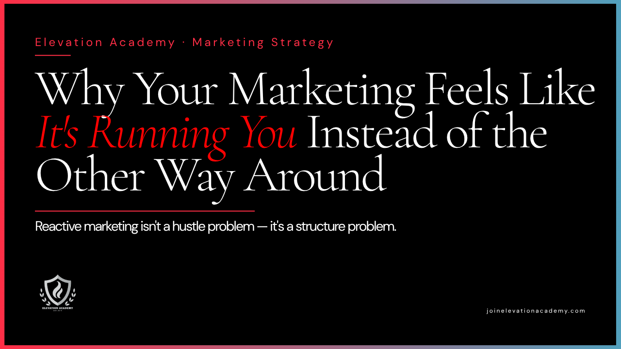Elevation Academy blog header for the article "Why Your Marketing Feels Like It's Running You Instead of the Other Way Around." Dark background with red and blue gradient bar. Subtitle reads: Reactive marketing isn't a hustle problem — it's a structure problem.