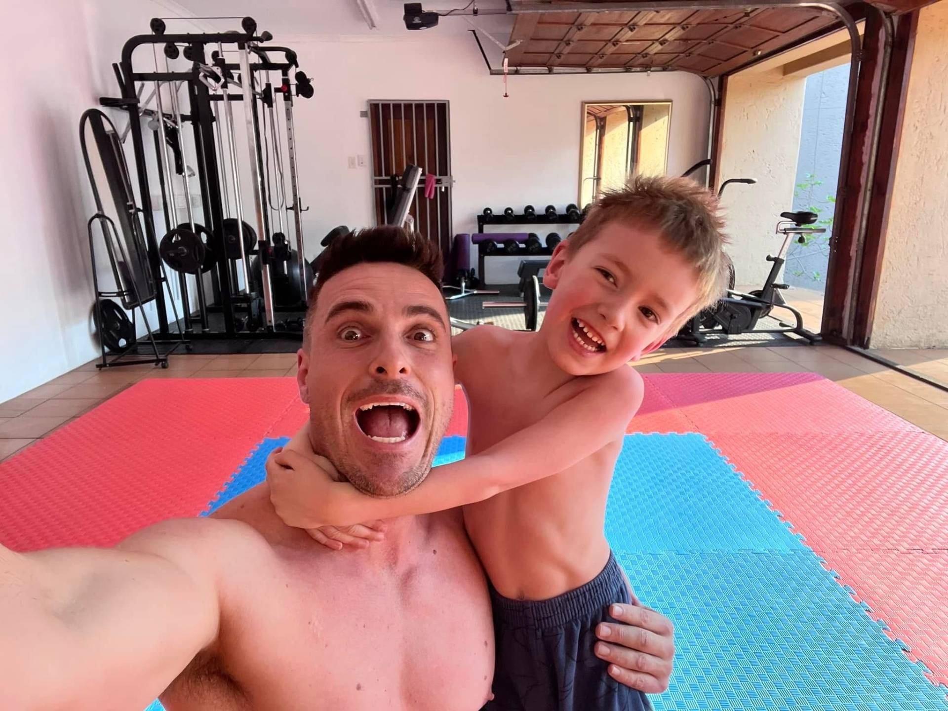 Jacque and Luke playing in the gym
