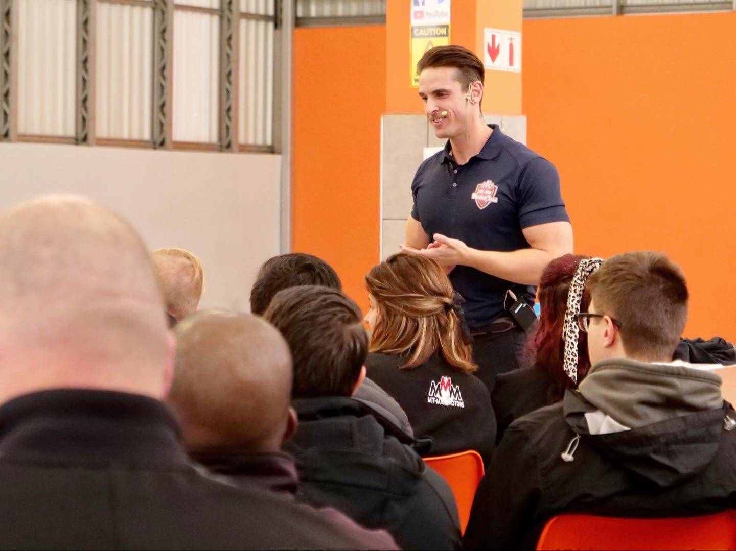 Jacque Visagie presenting to an audience