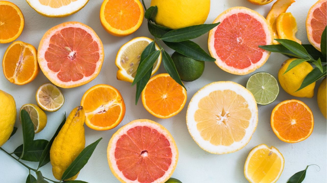 Citrus fruits over a light background