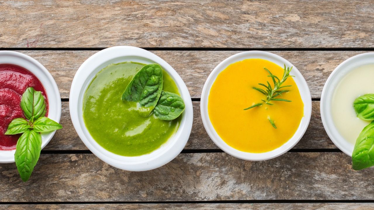 4 mini bowls of chilled summer vegan soups