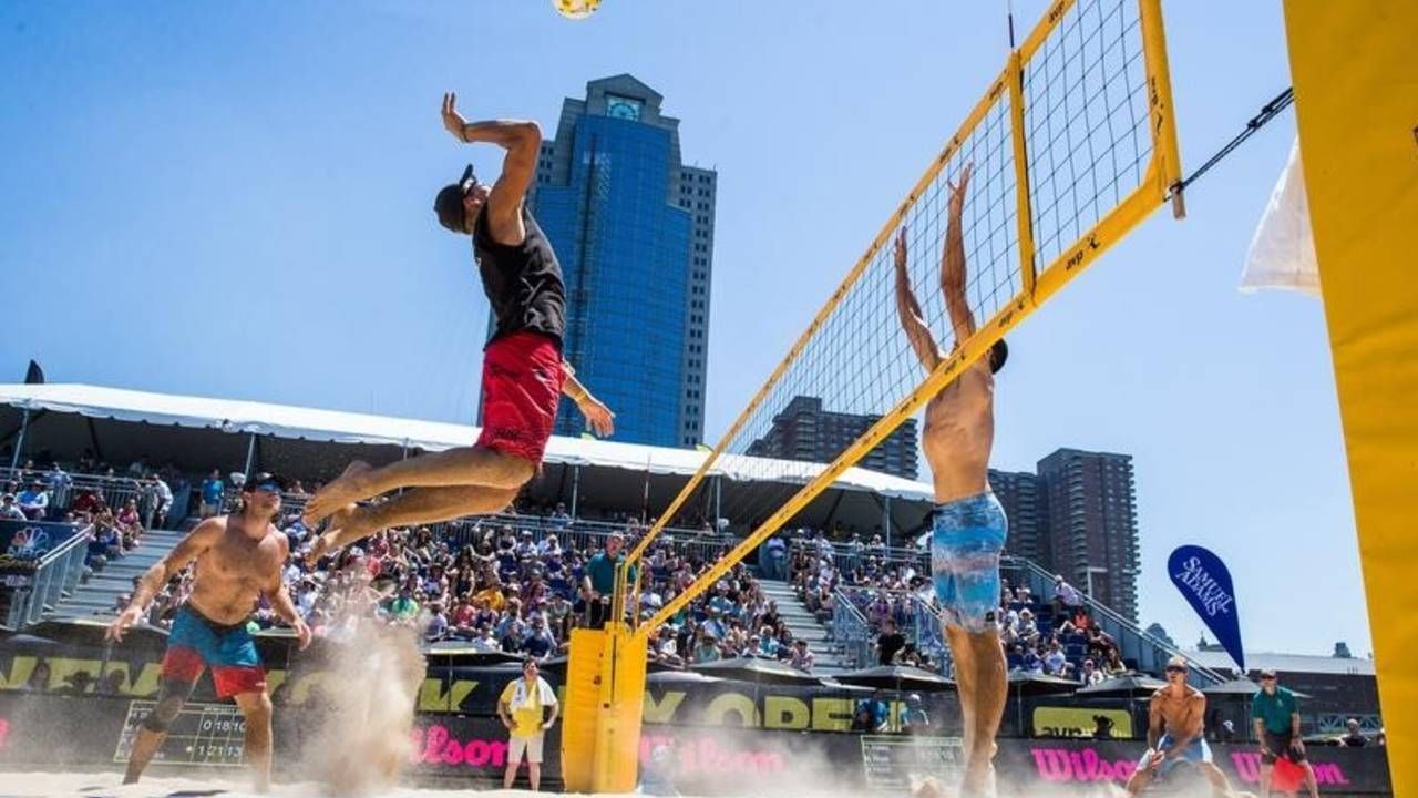 image of beach volleyball player at the net