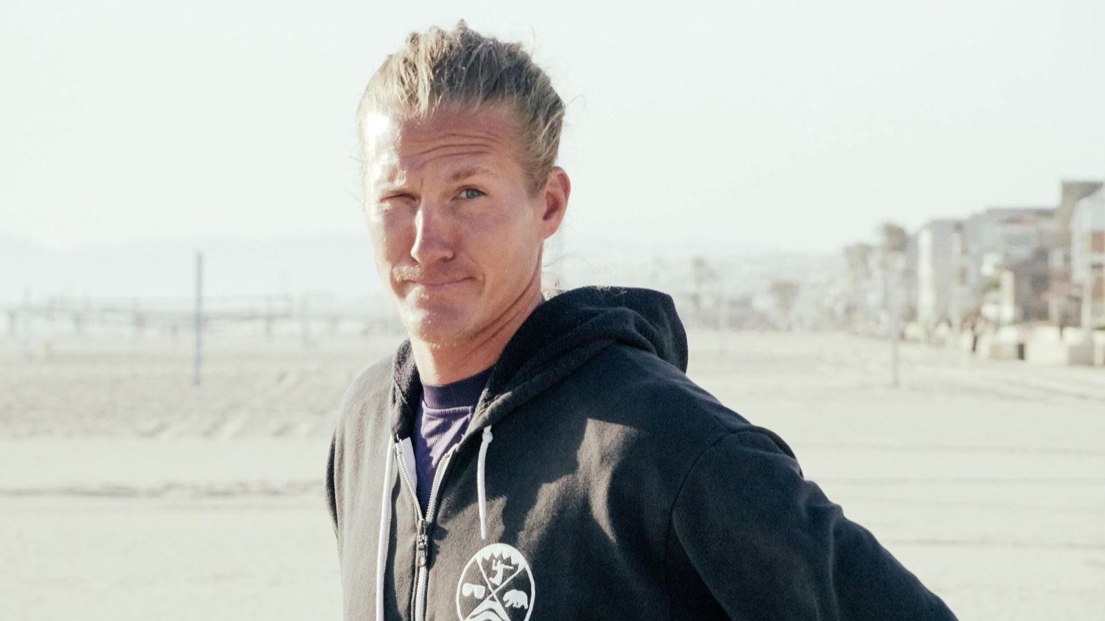 Coach Mark Burik on the beach at a volleyball training vacation