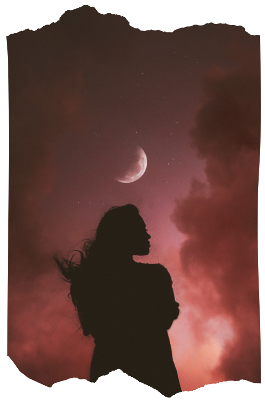 Silhouette of a woman standing beneath a crescent moon at dusk