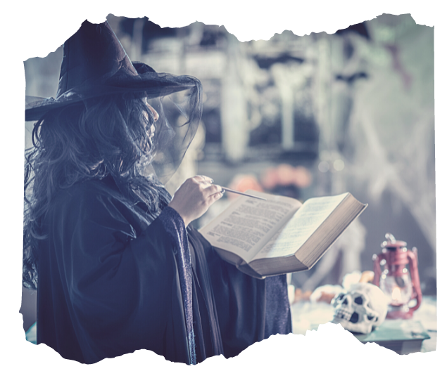 Witch in black hat reading a spell book at a candlelit altar — study guides and magical learning in Way of the Mage course