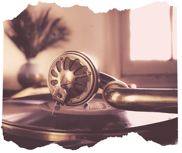 Close-up of a vintage brass phonograph and record player