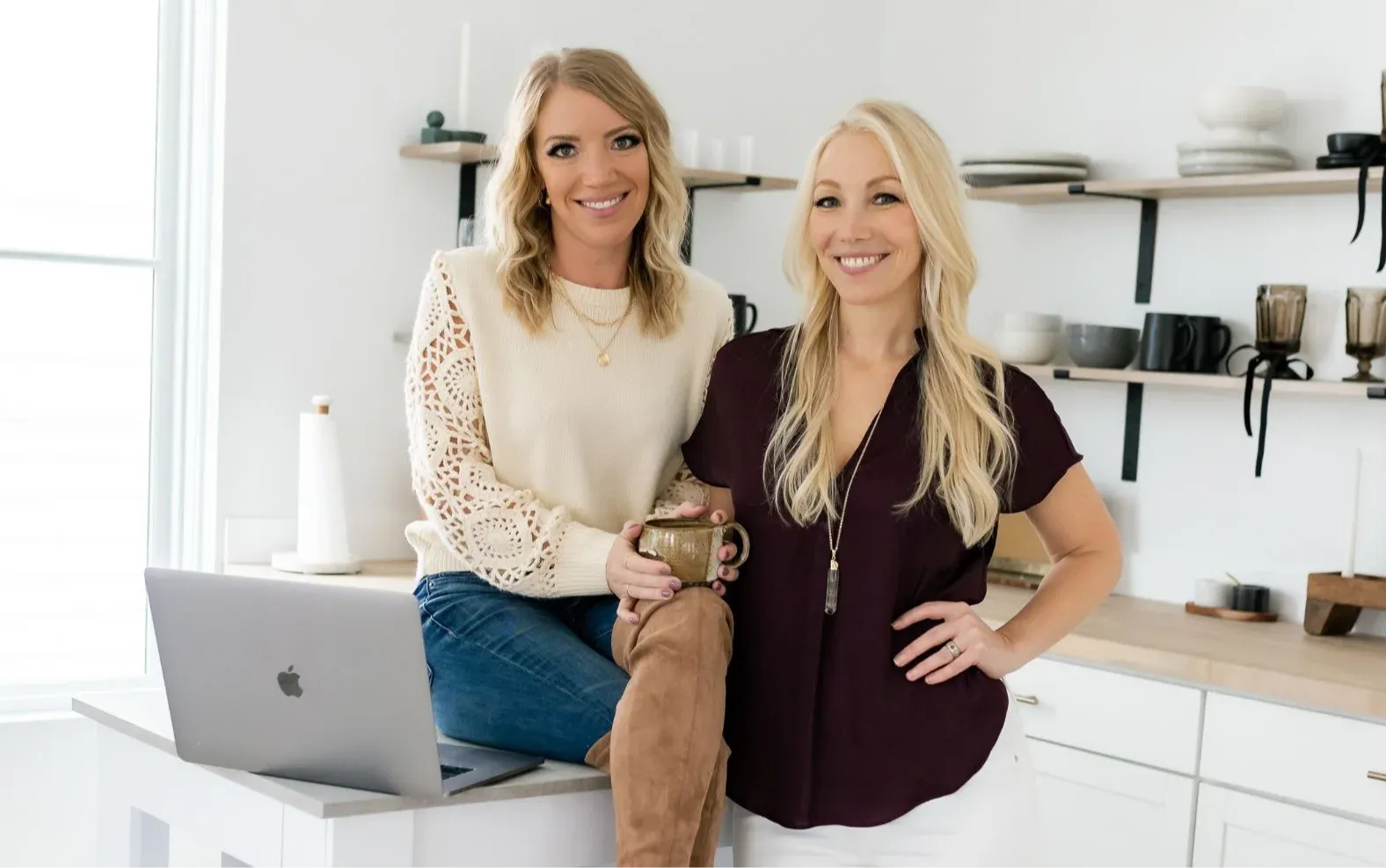 Claire VanBemmelen and Krissy Chin standing together during website build phase, representing strategic, purpose-driven web design by K+C Creative.