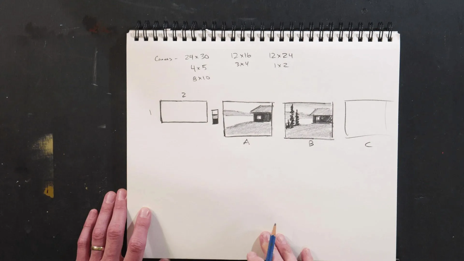 Thumbnail sketches in a sketchbook used to design a painting composition