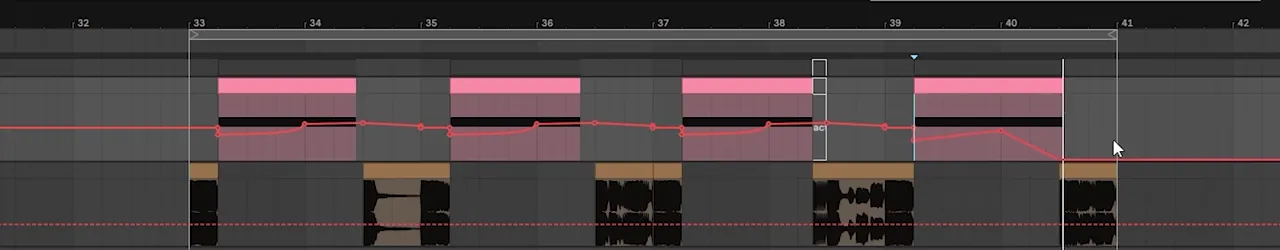 Ableton Live arrangement with four MIDI clips and pitch bend automation drawn in red: small bends on the first three hits and a low to midpoint to low bend on the last