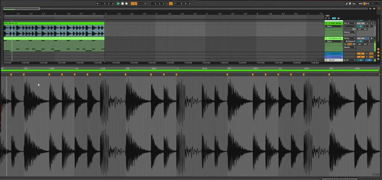 Drum break waveform in Ableton with transient markers snapped to the grid before layering
