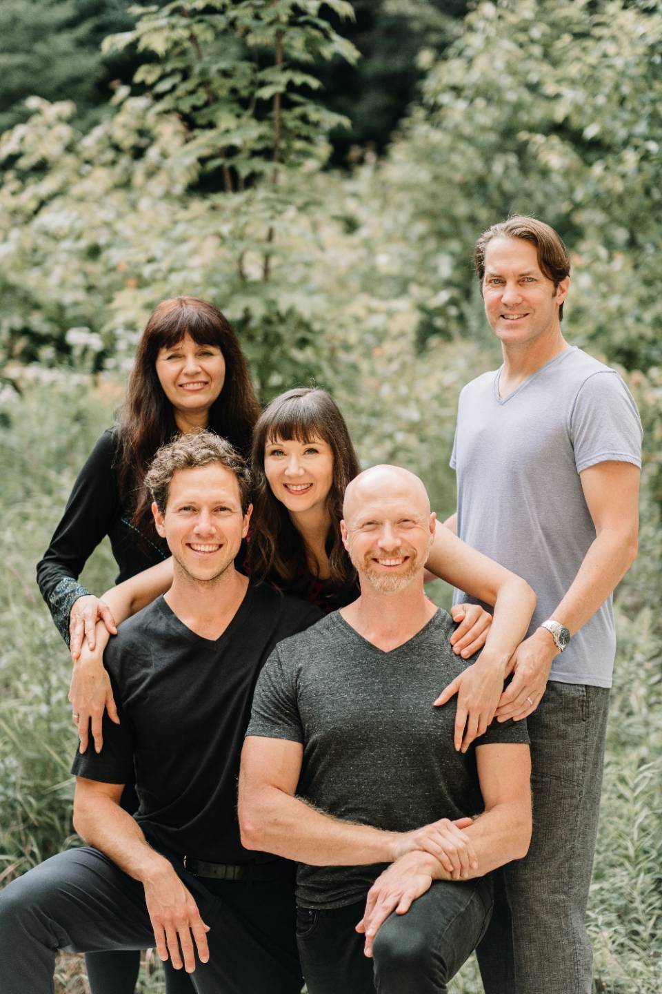 The five Thrive Hive practitioners photographed together outdoors