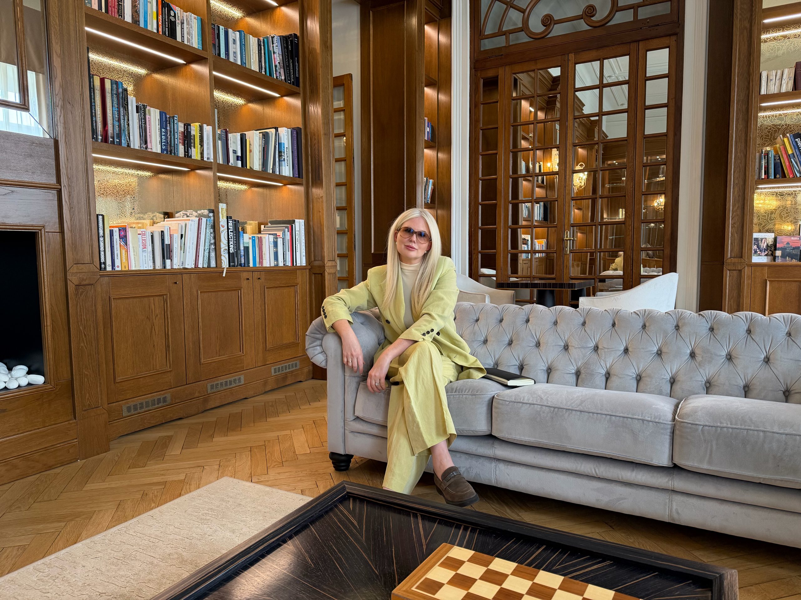 Poppy Delbridge in a palazzo library