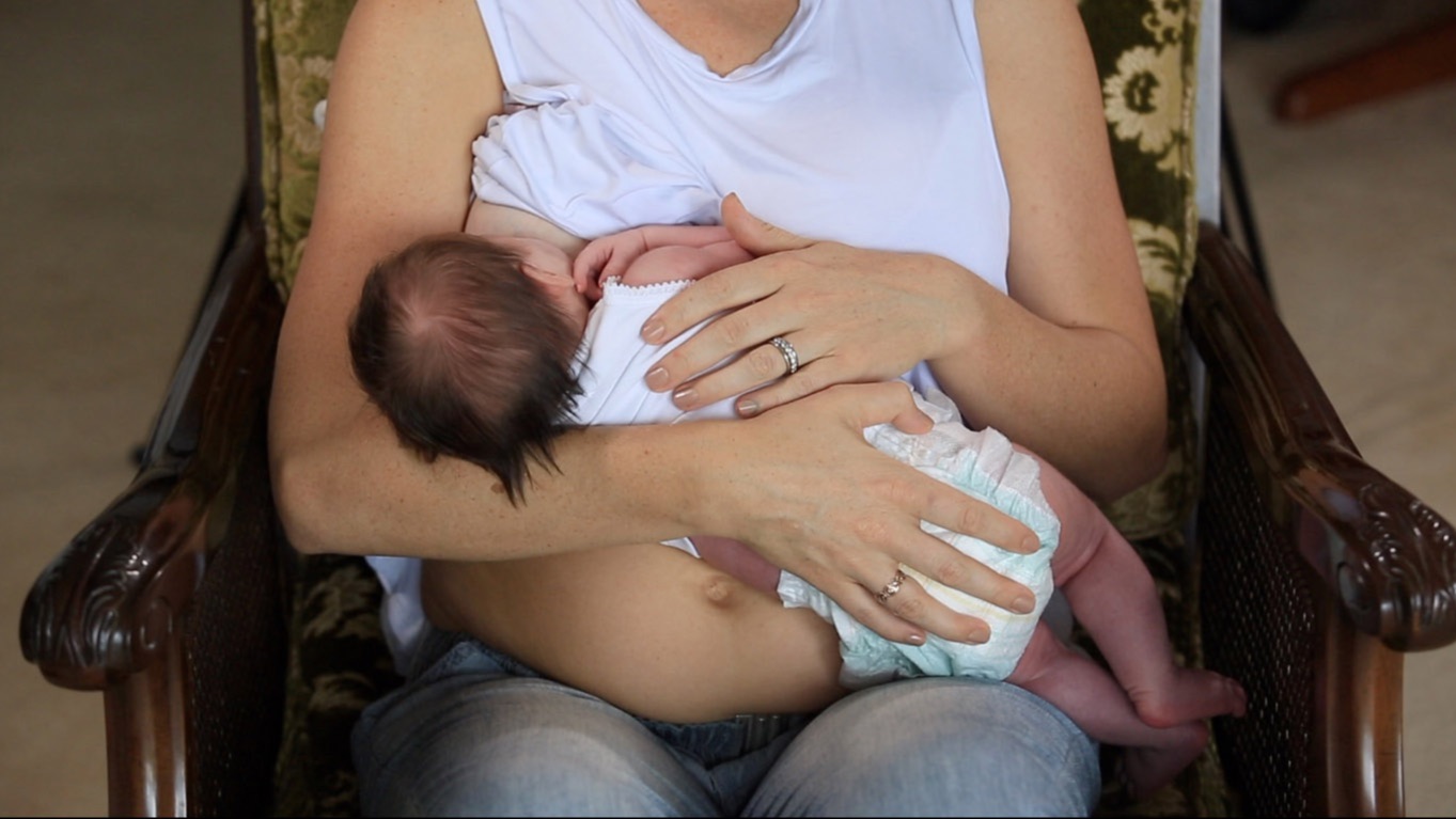 Gentle Cradle Hold of the Newborn baby