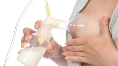 Women using electric breast pump