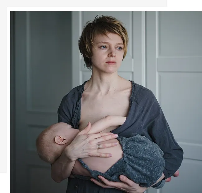 Woman breastfeeding sad face
