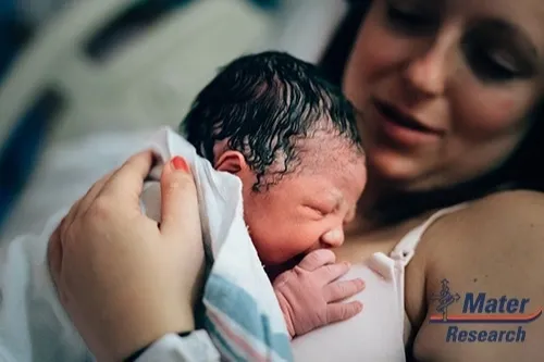 Newborn baby on mother after giving birth