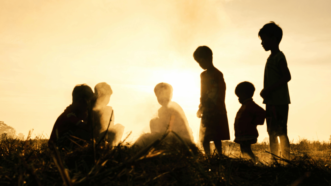 Image of many differently aged children to symbolise the many child parts present in Structural Dissociation model