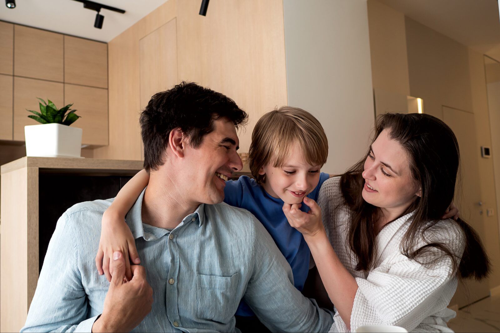 Family laughing together at home