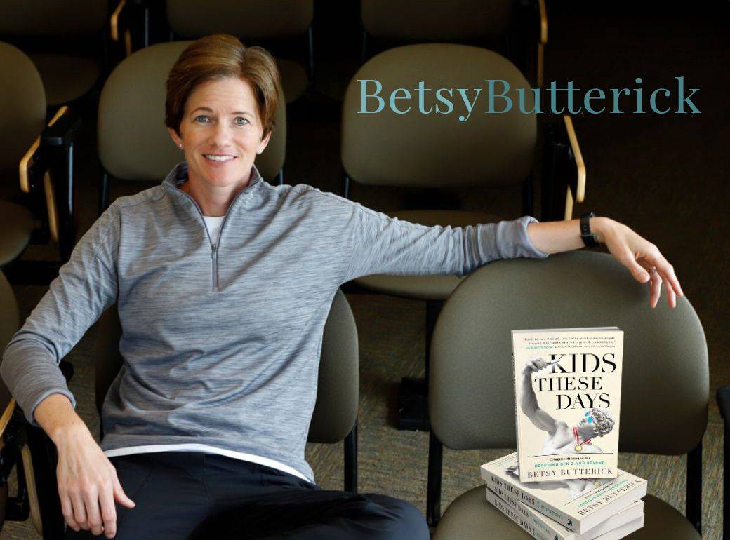Photo of Betsy and a stack of her new book "Kids These Days"