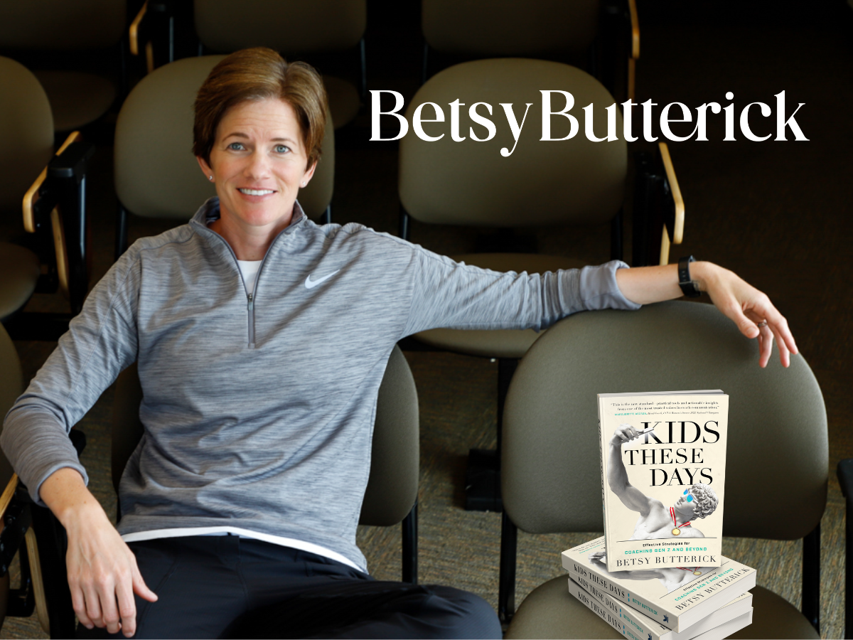Photo of Betsy and a stack of her new book "Kids These Days"