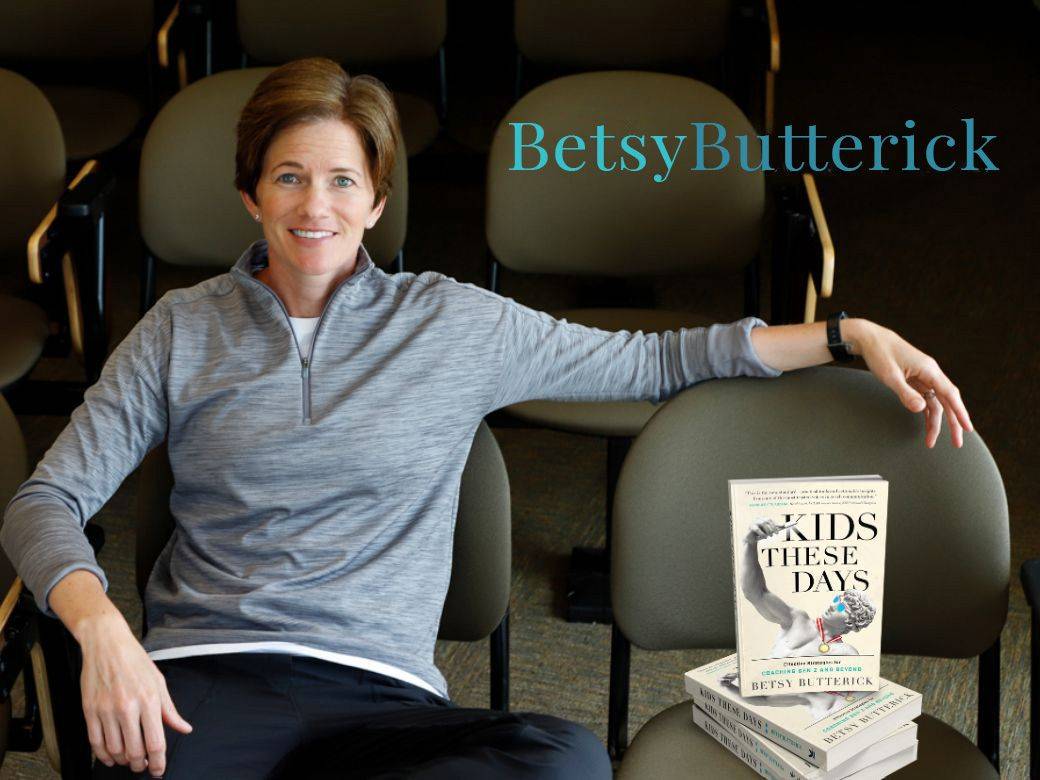 Photo of Betsy and a stack of her new book "Kids These Days"