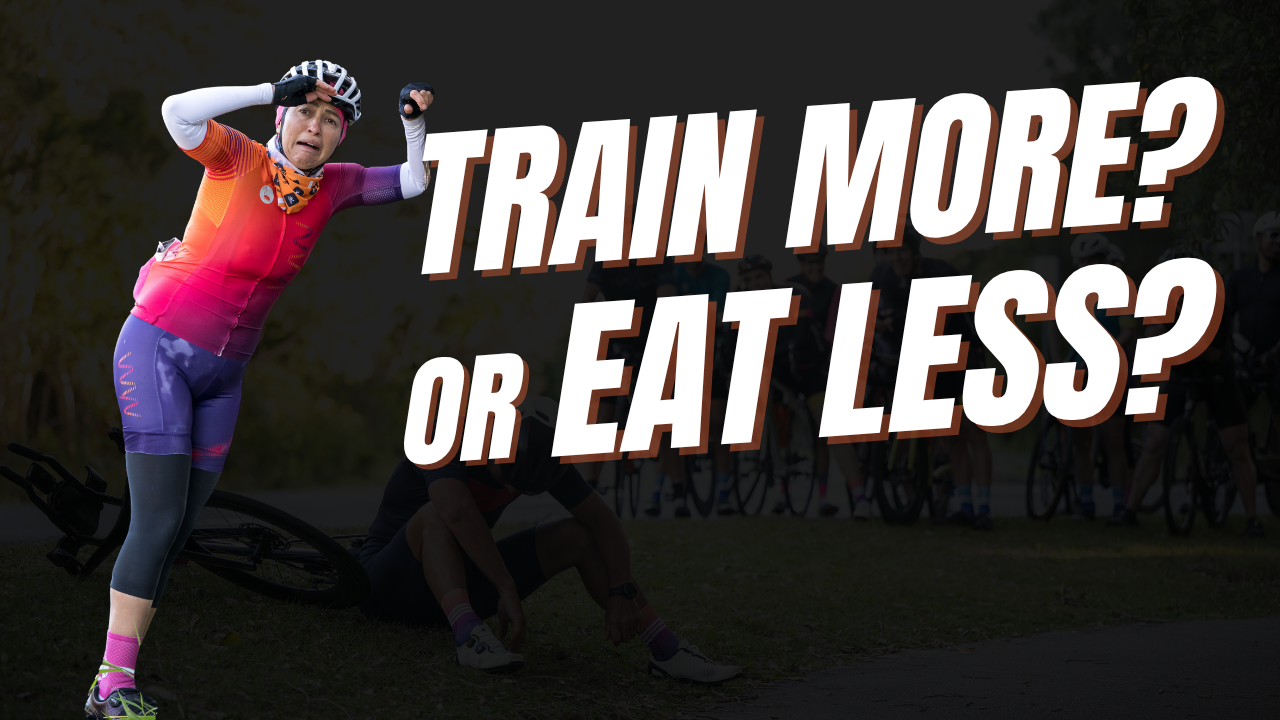  Tired triathlete sitting on the roadside mid ride, illustrating overtraining or under-fuelling in age group athletes