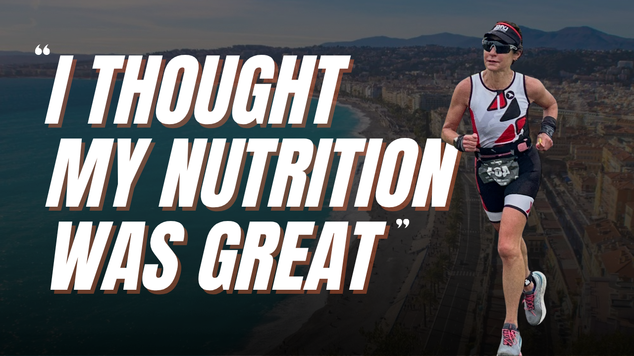 Triathlete running on a sunny race course, showing how to avoid triathlon gut issues on the run