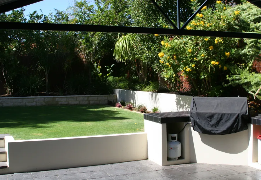 Established lawn beside an outdoor entertaining area