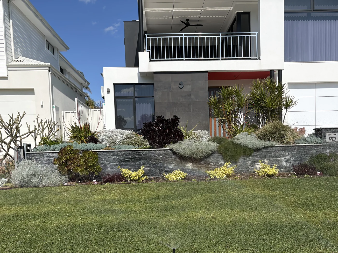 Finished lawn and property with active reticulation