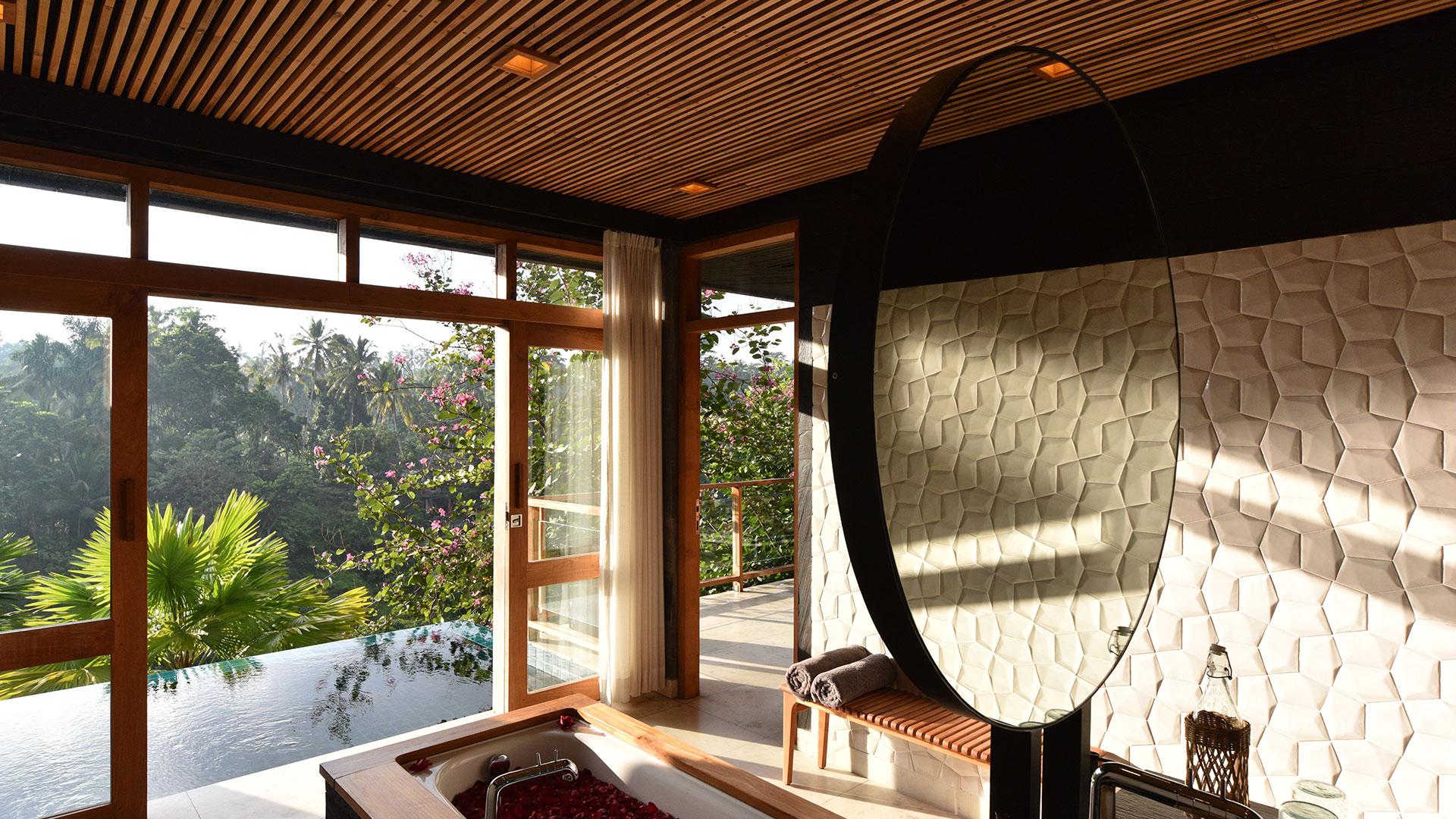 Deluxe Pool Suite bathroom overlooking its private pool at Chapung Sebali