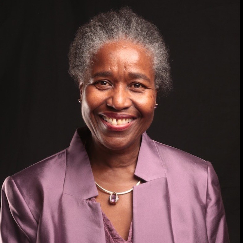 Dame Neslyn Watson-Druée, DBE