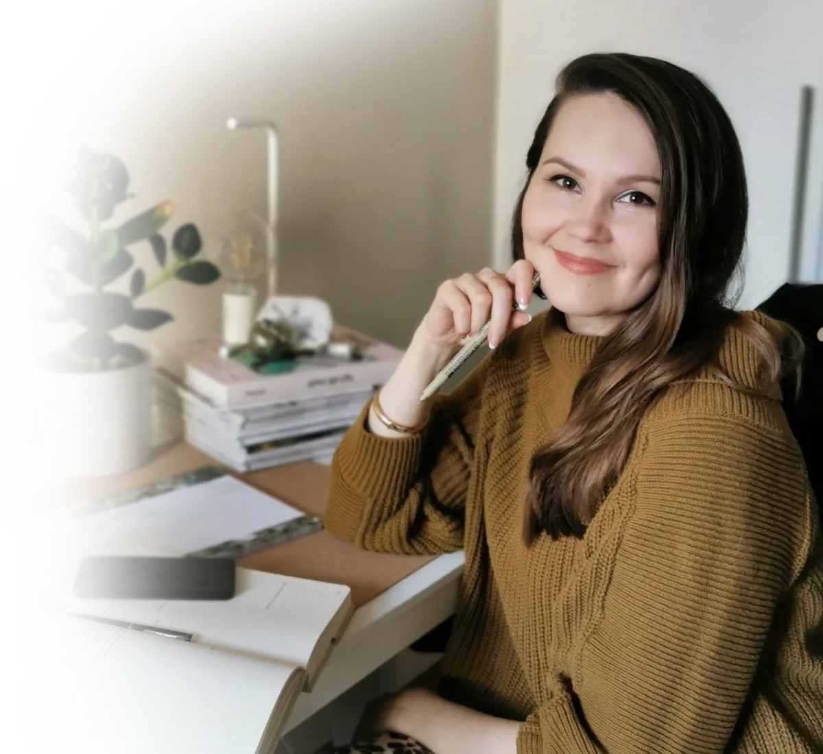 brand and kajabi website designer by her desk